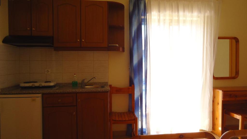 Panorama Hotel Амудия Стая снимка