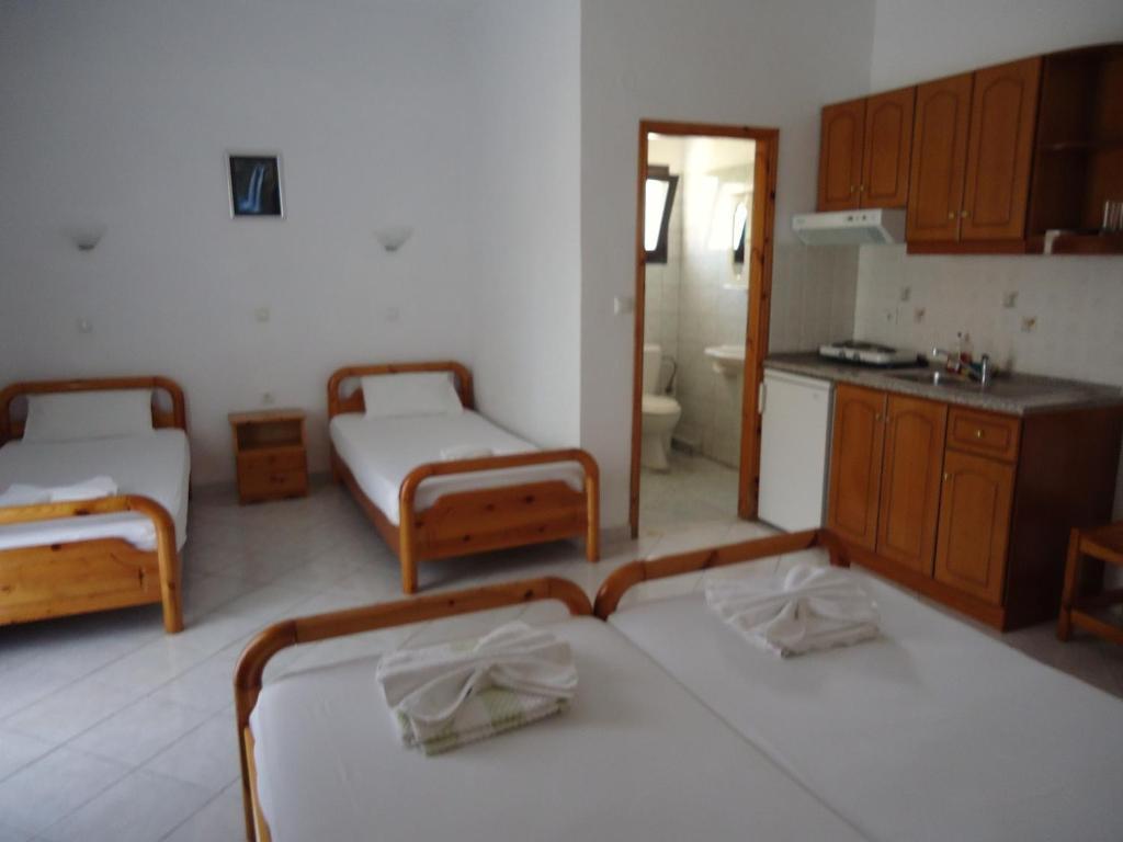 Panorama Hotel Амудия Стая снимка